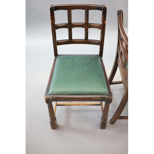 211 - A set of ten early 20th century oak and beech dining chairs,with cross frame backs and drop in seats... 