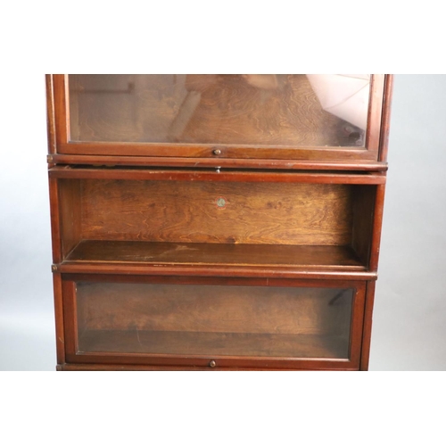 219 - A Globe Wernicke mahogany four section bookcase,with sliding glass doors and squared legs,W.86.5cm D... 