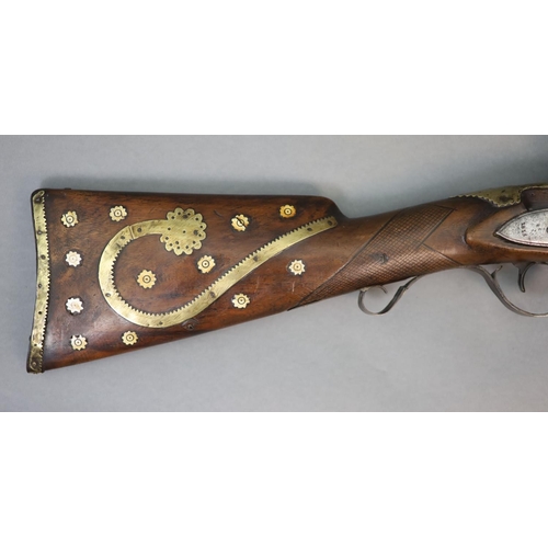 22 - An early 19th century Indian flintlock blunderbuss, East India Company,the barrel with remnants of p... 