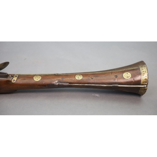 22 - An early 19th century Indian flintlock blunderbuss, East India Company,the barrel with remnants of p... 