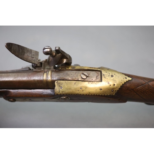 22 - An early 19th century Indian flintlock blunderbuss, East India Company,the barrel with remnants of p... 