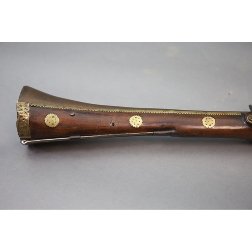 22 - An early 19th century Indian flintlock blunderbuss, East India Company,the barrel with remnants of p... 