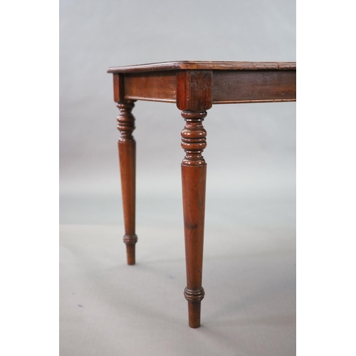 222 - A pair of late Victorian mahogany writing tables,with rounded rectangular tops, one with infilled re... 