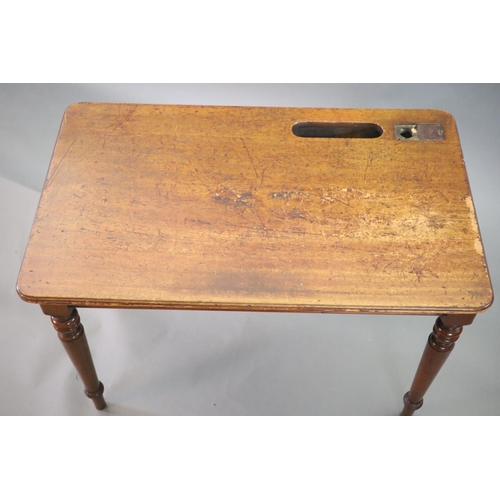 222 - A pair of late Victorian mahogany writing tables,with rounded rectangular tops, one with infilled re... 