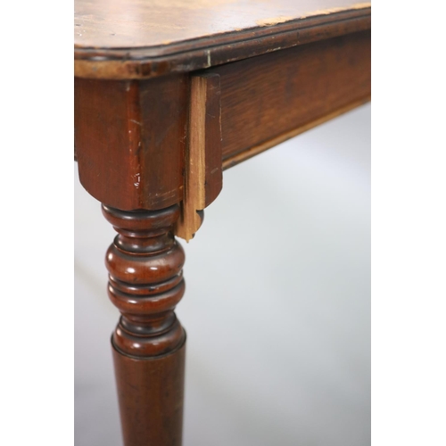 222 - A pair of late Victorian mahogany writing tables,with rounded rectangular tops, one with infilled re... 