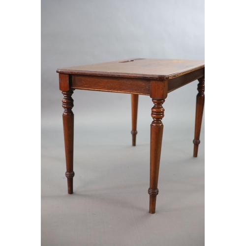 222 - A pair of late Victorian mahogany writing tables,with rounded rectangular tops, one with infilled re... 