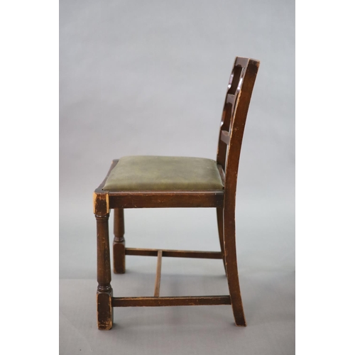 223 - A set of eight early 20th century oak and beech dining chairs,with cross frame backs and drop in sea... 