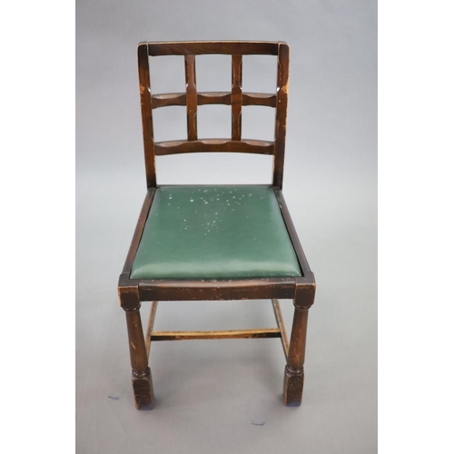 223 - A set of eight early 20th century oak and beech dining chairs,with cross frame backs and drop in sea... 