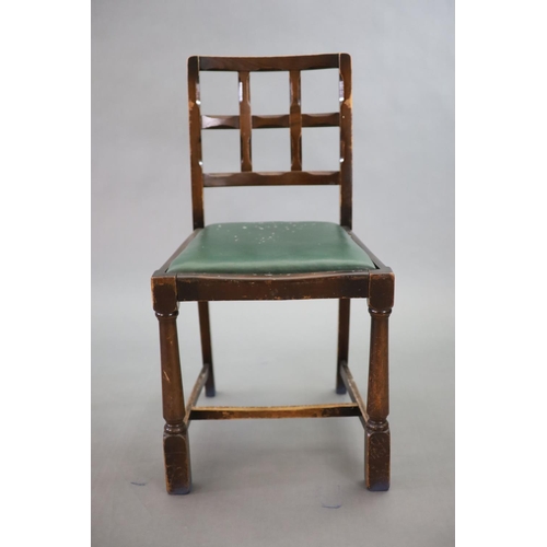 223 - A set of eight early 20th century oak and beech dining chairs,with cross frame backs and drop in sea... 