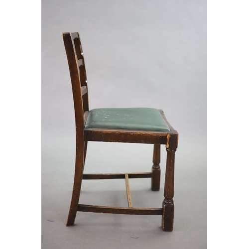 223 - A set of eight early 20th century oak and beech dining chairs,with cross frame backs and drop in sea... 