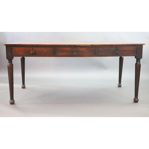 224 - A late Victorian mahogany library table,fitted four short and one deep drawer to one side of the fri... 