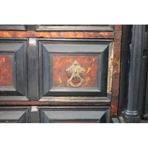 235 - A late 17th century Portuguese ebony and tortoiseshell table cabinet,of breakfront rectangular form ... 