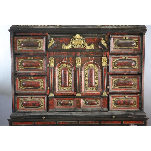 236 - A late 17th century Portuguese ormolu mounted ebony and red tortoiseshell cabinet on stand,of archit... 