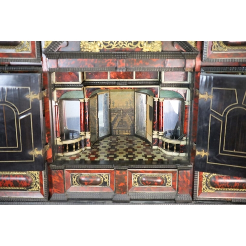 236 - A late 17th century Portuguese ormolu mounted ebony and red tortoiseshell cabinet on stand,of archit... 