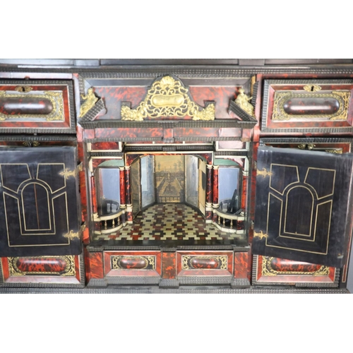 236 - A late 17th century Portuguese ormolu mounted ebony and red tortoiseshell cabinet on stand,of archit... 