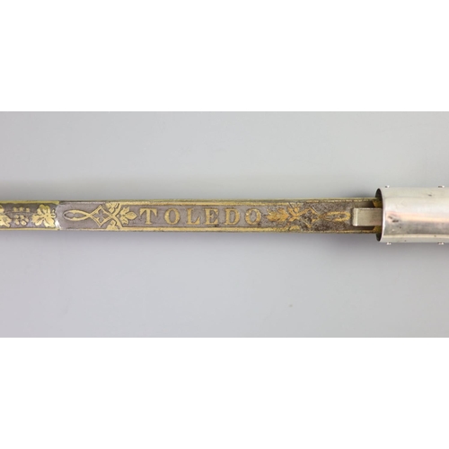 24 - A French Toledo bladed swordstick, 19th centurythe blade engraved Toledo within floral borders, wi... 