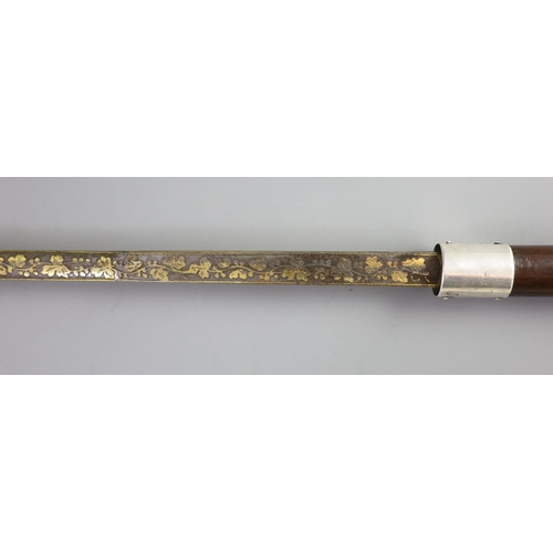 24 - A French Toledo bladed swordstick, 19th centurythe blade engraved Toledo within floral borders, wi... 