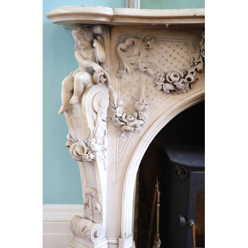 242 - An important mid 19th century Italian white Carrara marble chimney piece,carved in the rococo taste,... 