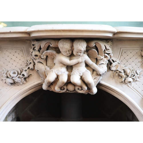 242 - An important mid 19th century Italian white Carrara marble chimney piece,carved in the rococo taste,... 