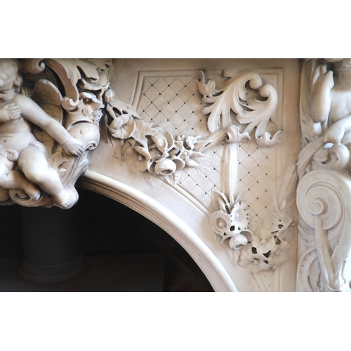 242 - An important mid 19th century Italian white Carrara marble chimney piece,carved in the rococo taste,... 