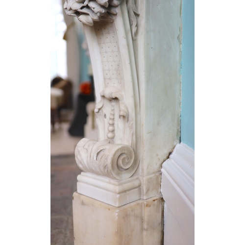 242 - An important mid 19th century Italian white Carrara marble chimney piece,carved in the rococo taste,... 