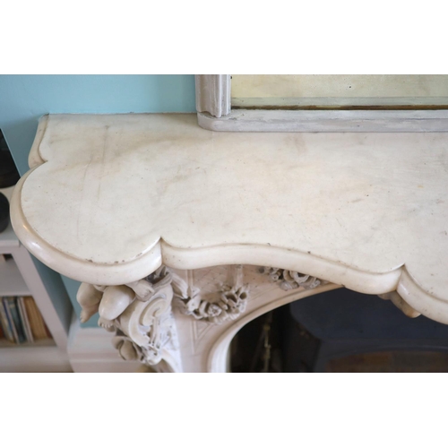 242 - An important mid 19th century Italian white Carrara marble chimney piece,carved in the rococo taste,... 