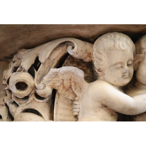 242 - An important mid 19th century Italian white Carrara marble chimney piece,carved in the rococo taste,... 