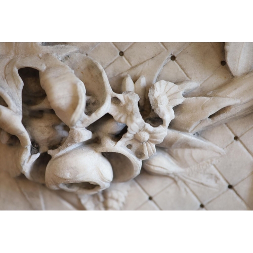 242 - An important mid 19th century Italian white Carrara marble chimney piece,carved in the rococo taste,... 