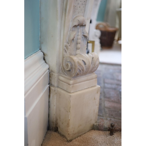 242 - An important mid 19th century Italian white Carrara marble chimney piece,carved in the rococo taste,... 