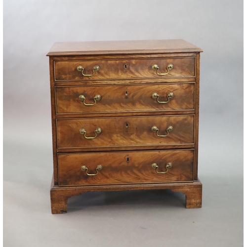 243 - An unusually small George III mahogany chest of drawers,of four graduated long drawers, fitted brass... 