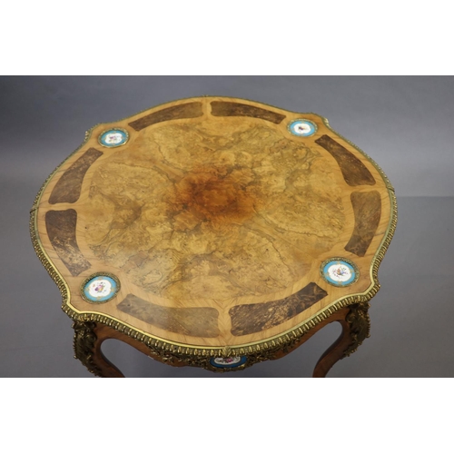 263 - A Victorian Louis XV style ormolu mounted walnut centre table,inset with Sevres style porcelain plaq... 