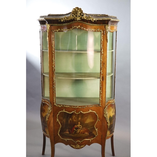 264 - A Louis XV style mahogany vitrine,of serpentine form with a shelved interior above vignettes painted... 