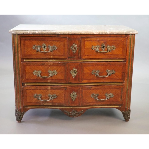 265 - A Louis XVI parquetry serpentine commode,with variegated grey marble top, two short and two long dra... 