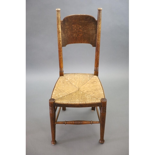 266 - A set of six oak chairs, including a pair of carvers, in the Glasgow School manner by William Birch,... 