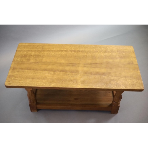 268 - A Thompson of Kilburn Mouseman oak 'refectory' coffee table,with rounded rectangular top on tapered ... 