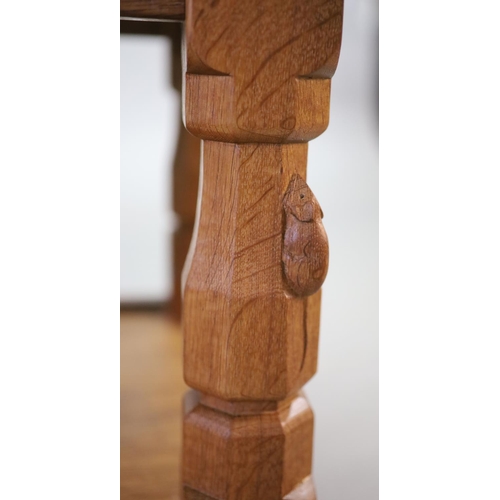 268 - A Thompson of Kilburn Mouseman oak 'refectory' coffee table,with rounded rectangular top on tapered ... 