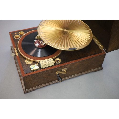 28 - A HMV Lumiere model oak cased 460 gramophone, c1925,with original (unbroken) Lumiere pleated gilt di... 