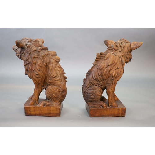 35 - After Pietro Tacca (1577-1640), a pair of early 20th century walnut carvingsFlorentine boars (Il Por... 