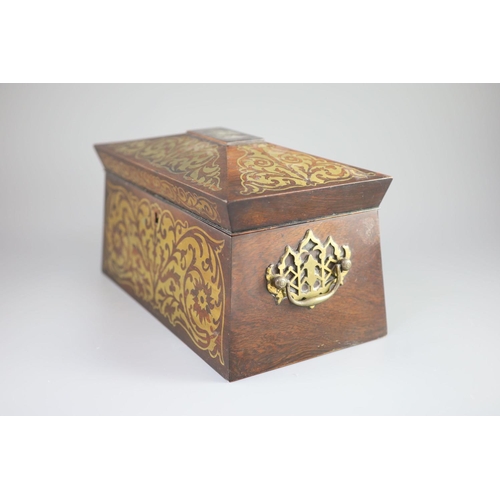 40 - An early 19th century brass inlaid rosewood tea caddy in the boulle manner,of sarcophagus form, the ... 