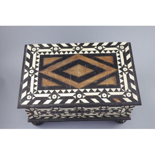 41 - An early 18th century Dutch Colonial casket,inlaid with bone and ebony, the hinged cover revealing a... 