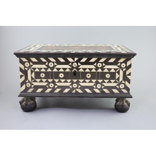 41 - An early 18th century Dutch Colonial casket,inlaid with bone and ebony, the hinged cover revealing a... 