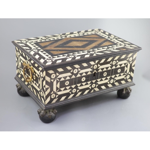 41 - An early 18th century Dutch Colonial casket,inlaid with bone and ebony, the hinged cover revealing a... 