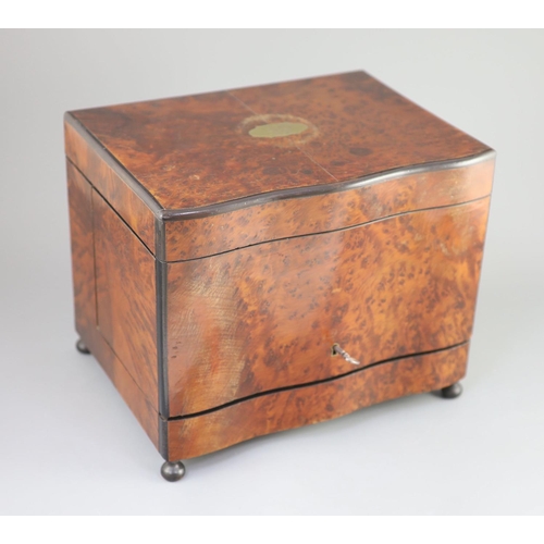 43 - A Victorian burr yew decanter box, c1880the serpentine cover opening to reveal a two tier interior a... 