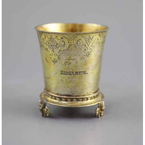 478 - An early 17th century Swiss? silver gilt beaker,Of flared form, with engraved decoration, name and i... 