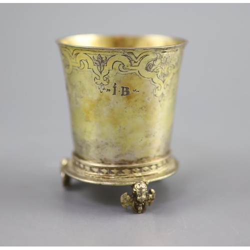 478 - An early 17th century Swiss? silver gilt beaker,Of flared form, with engraved decoration, name and i... 