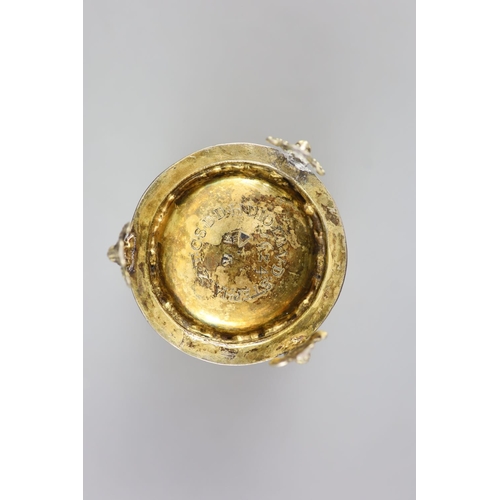 478 - An early 17th century Swiss? silver gilt beaker,Of flared form, with engraved decoration, name and i... 