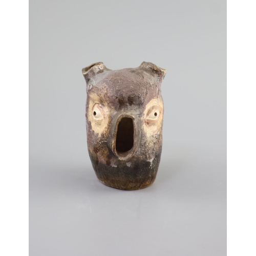 64 - An unusual Martin Bros stoneware grotesque bulb pot, dated 1907,modelled as a head with holes at the... 