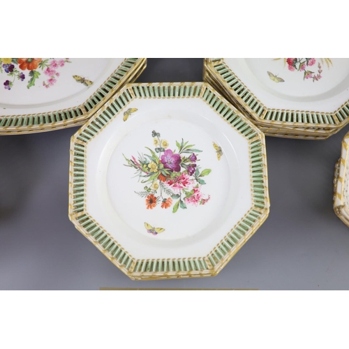 72 - A Berlin porcelain dessert service, mid 19th century,each piece of octagonal shape, painted with flo... 