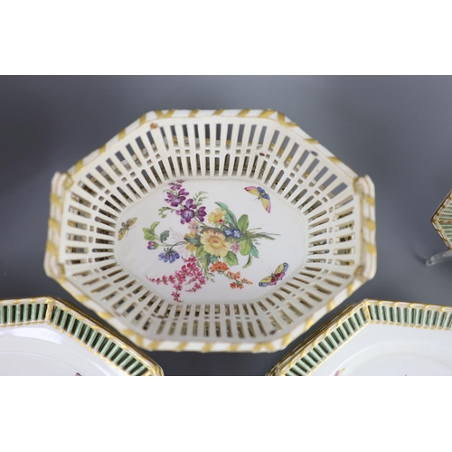 72 - A Berlin porcelain dessert service, mid 19th century,each piece of octagonal shape, painted with flo... 