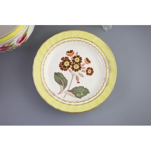 76 - A group of Derby yellow ground botanical dessert and dinner wares, c.1790-1810,each piece painted wi... 